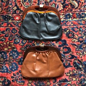 Vintage clutches with decorative handles